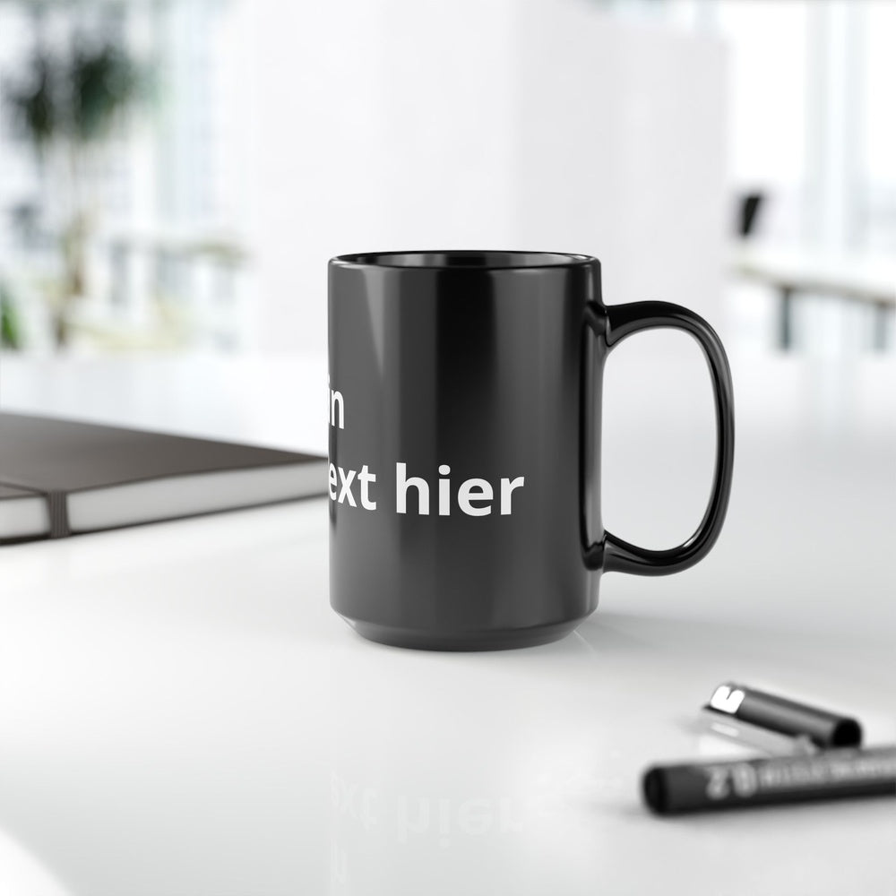 Individuell gestaltbare schwarze Keramiktasse mit Wunschtext als persönliche Geschenkidee.