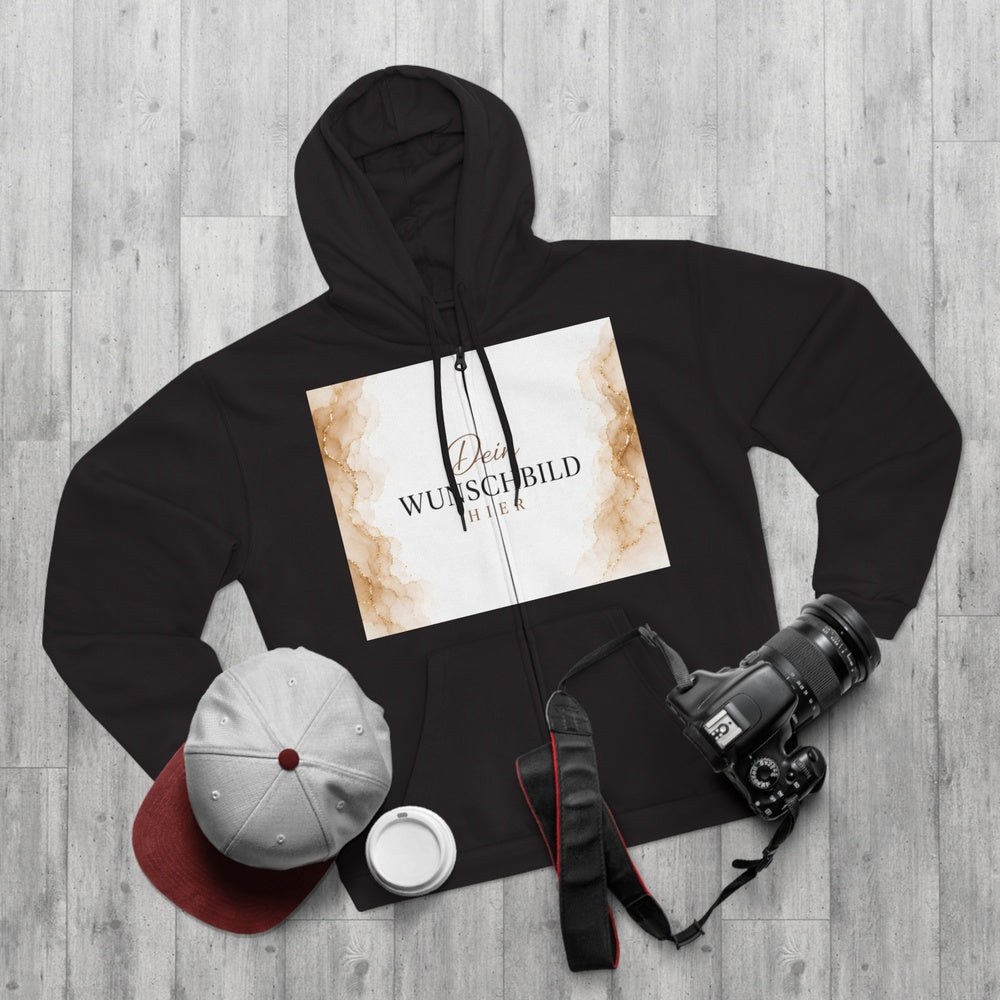 Schwarzer personalisierbarer Zipper Hoodie als Flatlay mit Kamera, Cap und Kaffeebecher – ideal für individuelle Fotodrucke.