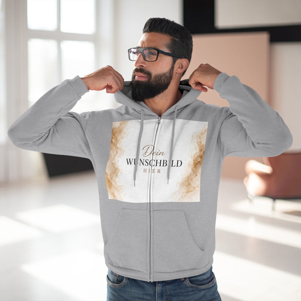 Mann trägt einen Heather Grey Zipper Hoodie mit individuell gestaltbarer Vorderseite und Wunschmotiv.