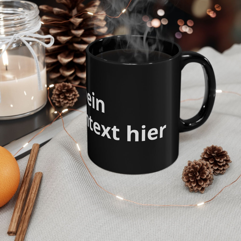 Individuell gestaltbare schwarze Keramiktasse mit eigenem Text für Alltag, Büro oder Zuhause.